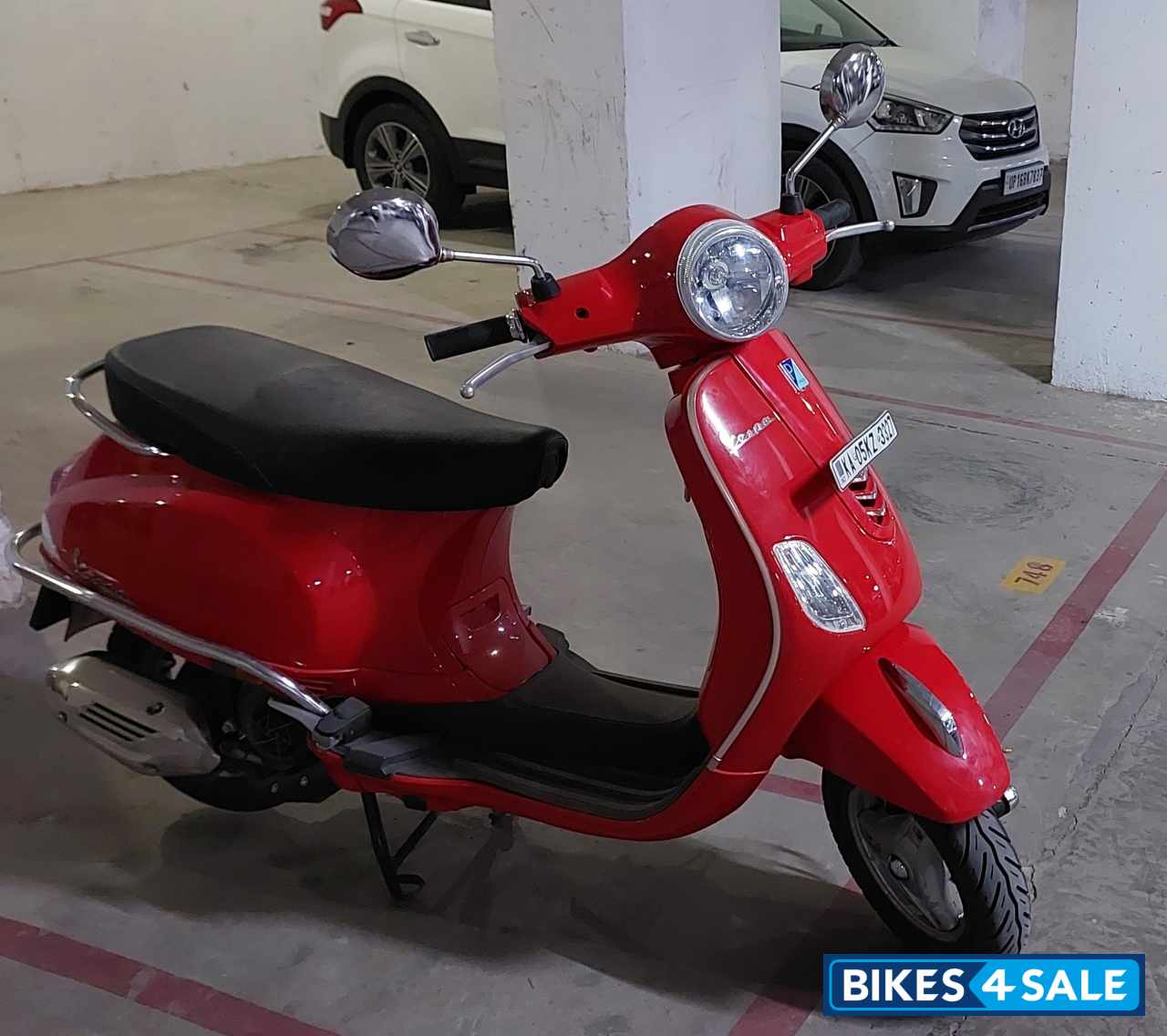 Red Vespa ZX 125 BS6