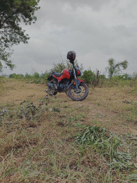 Red & Black Hero Xtreme 160R 100 Million Edition