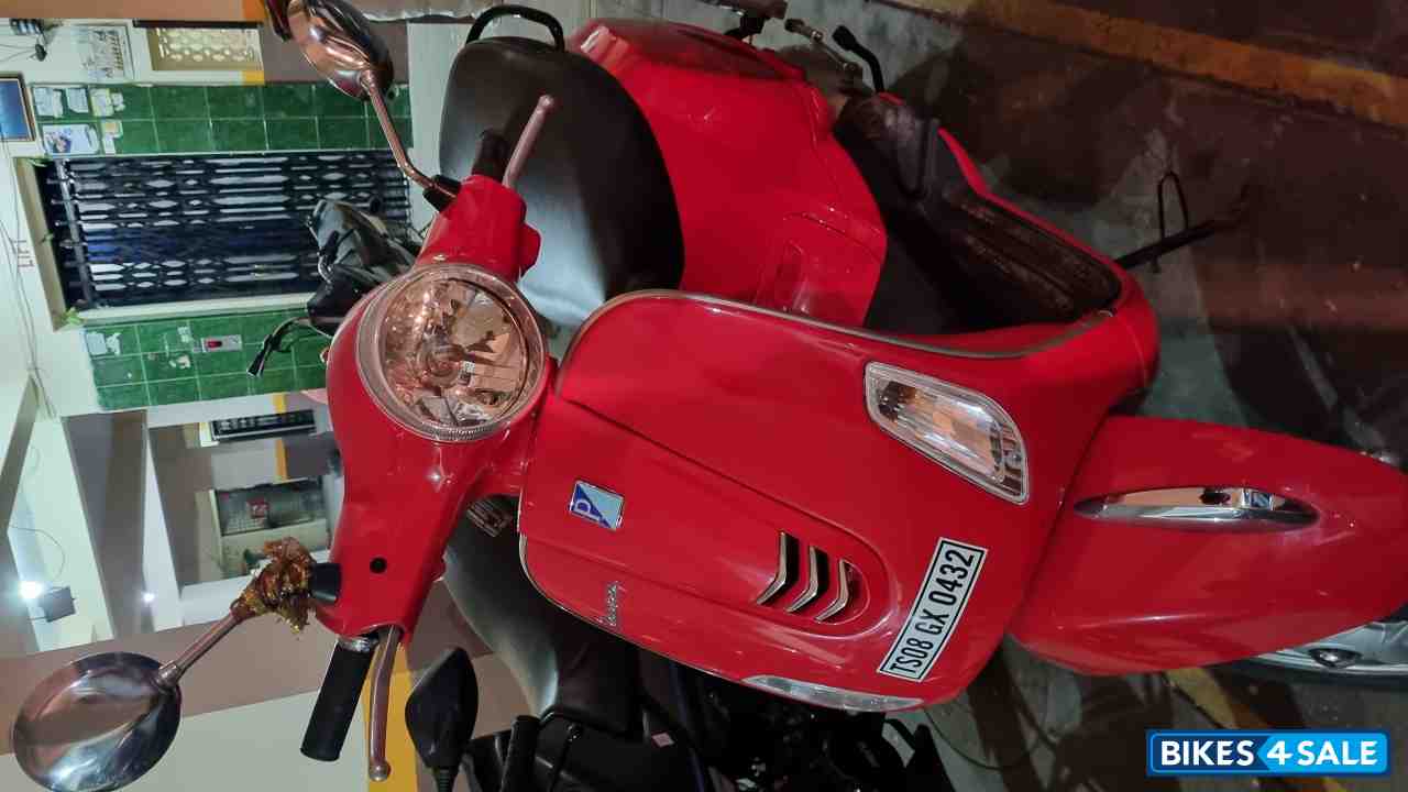 Red Vespa ZX 125