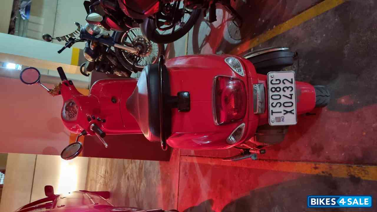Red Vespa ZX 125