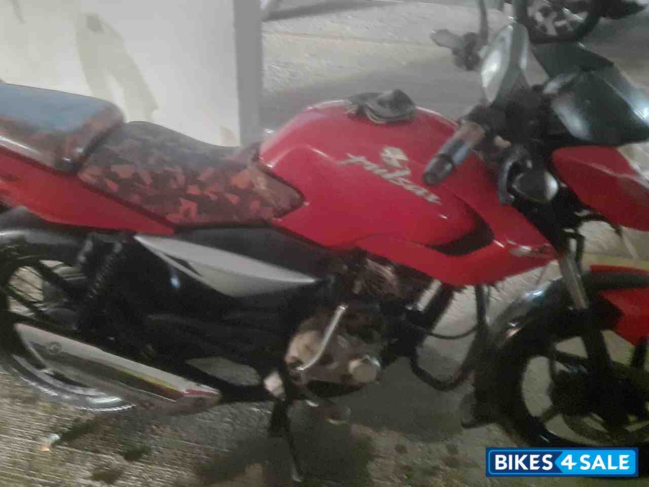 Red Bajaj Pulsar 135LS