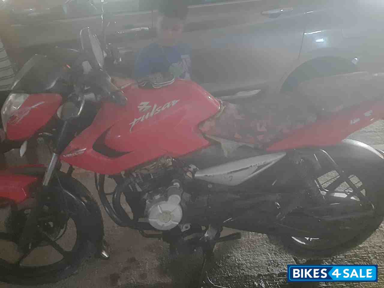 Red Bajaj Pulsar 135LS