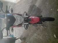 Red Bajaj Pulsar 135LS