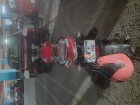 Red Bajaj Pulsar 135LS