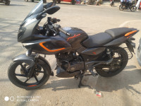Orange And Black Bajaj Pulsar 180F Neon