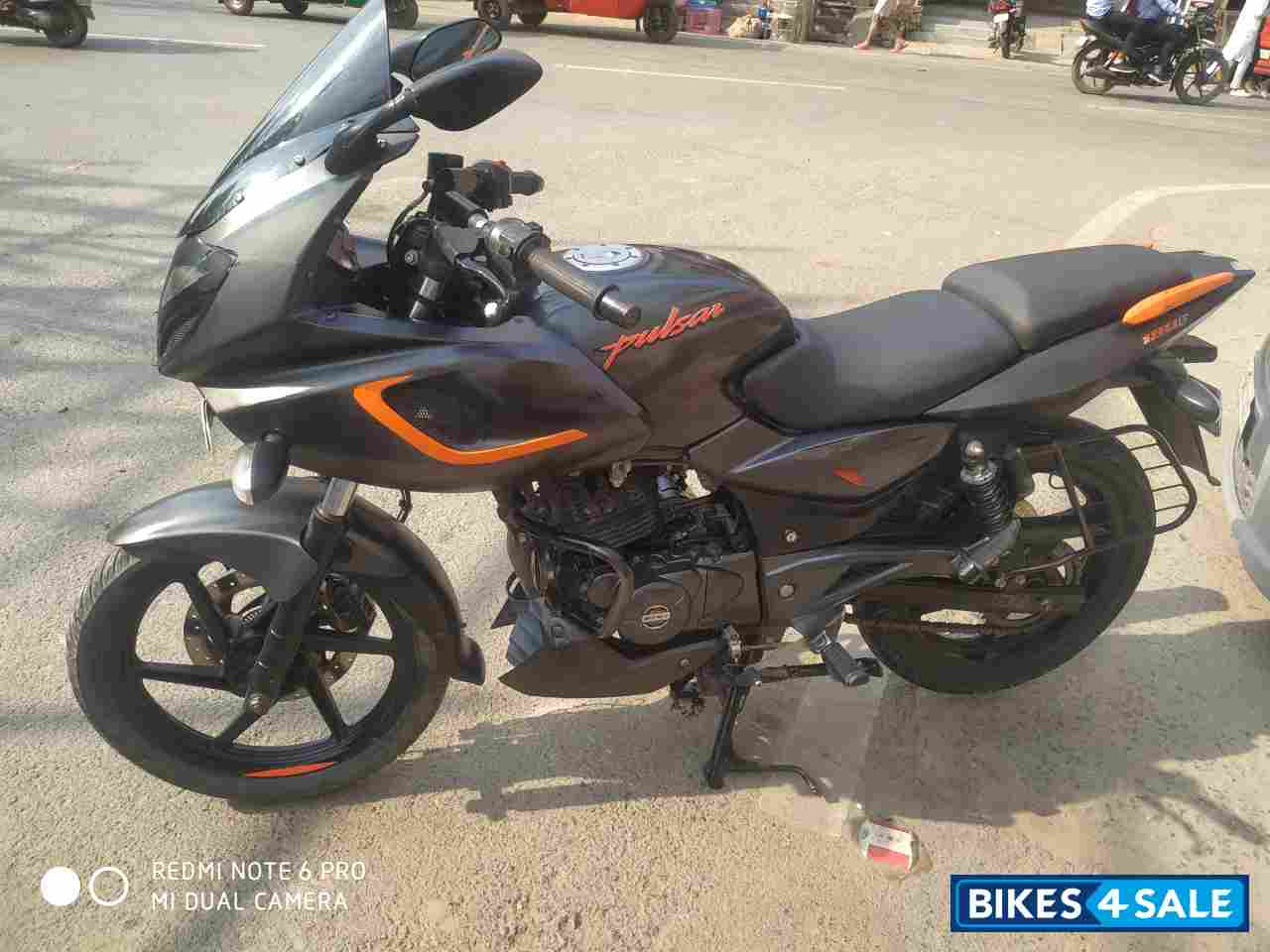 Orange And Black Bajaj Pulsar 180F Neon