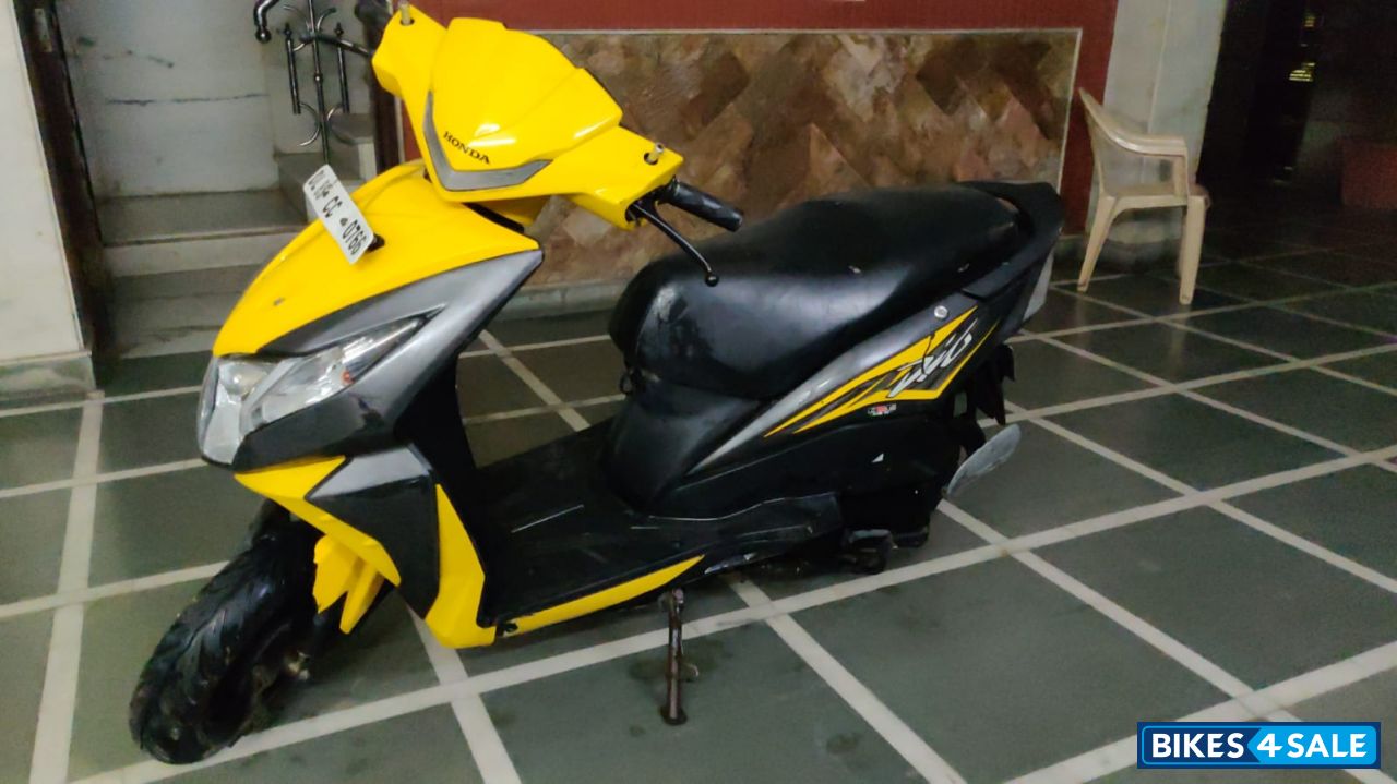 Matt Black With Shining Yellow Honda Dio