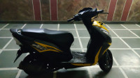 Matt Black With Shining Yellow Honda Dio
