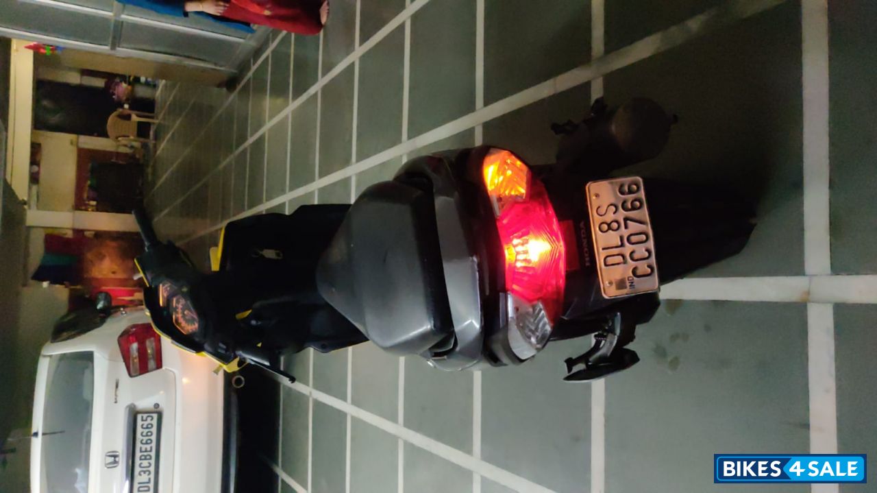 Matt Black With Shining Yellow Honda Dio