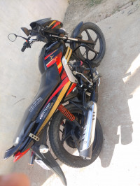 Red Black Mix Mahindra Centuro Rockstar