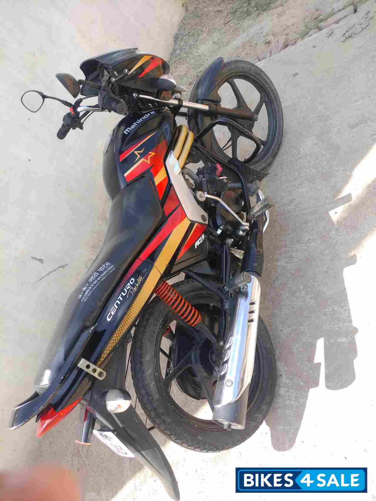 Red Black Mix Mahindra Centuro Rockstar