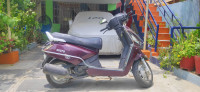 Magenta Mahindra Gusto