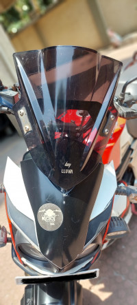 Red-white Mahindra Mojo