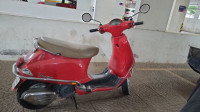 Red Vespa LX 125