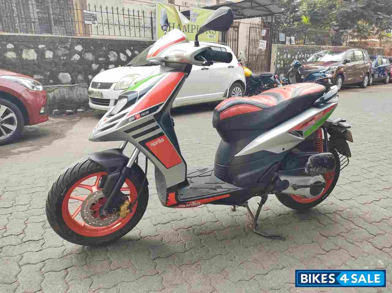 Silver Red Aprilia SR 150 Race