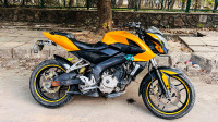 Yellow And Black Bajaj Pulsar 200 NS