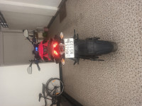 Red, Black Bajaj Pulsar NS200