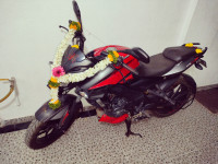 Red, Black Bajaj Pulsar NS200