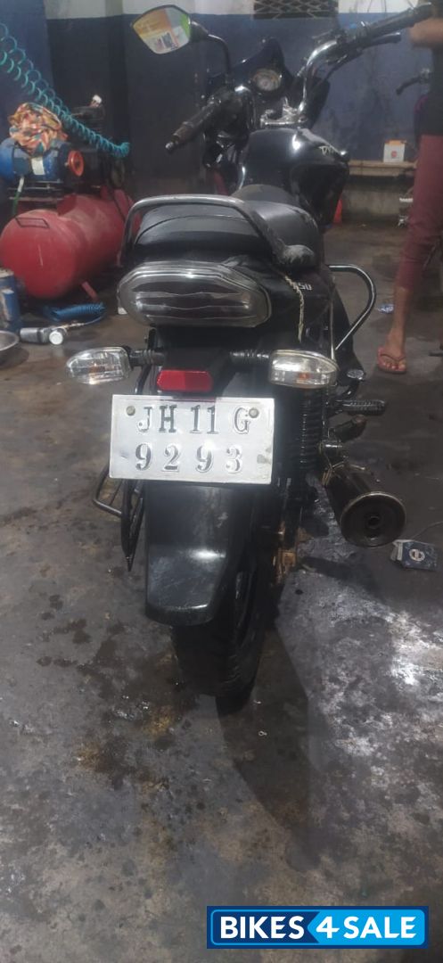 Black Golden Bajaj Discover 150 S