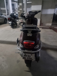 Maroon Vespa LX 125