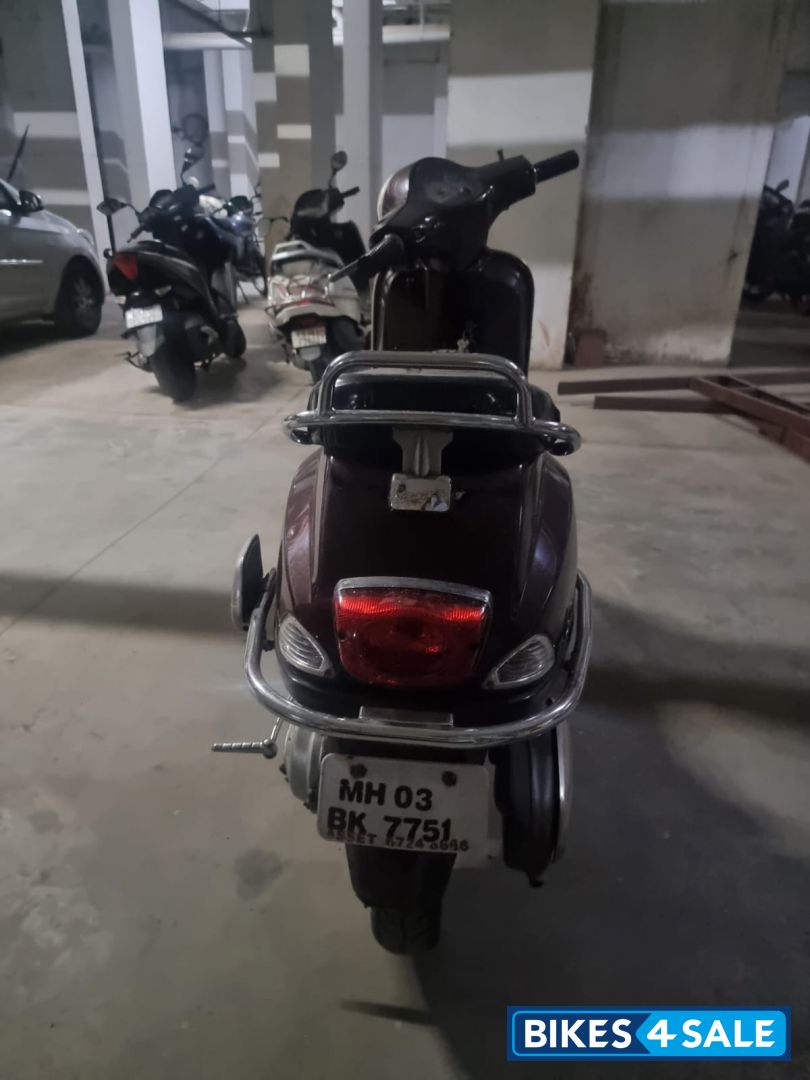 Maroon Vespa LX 125