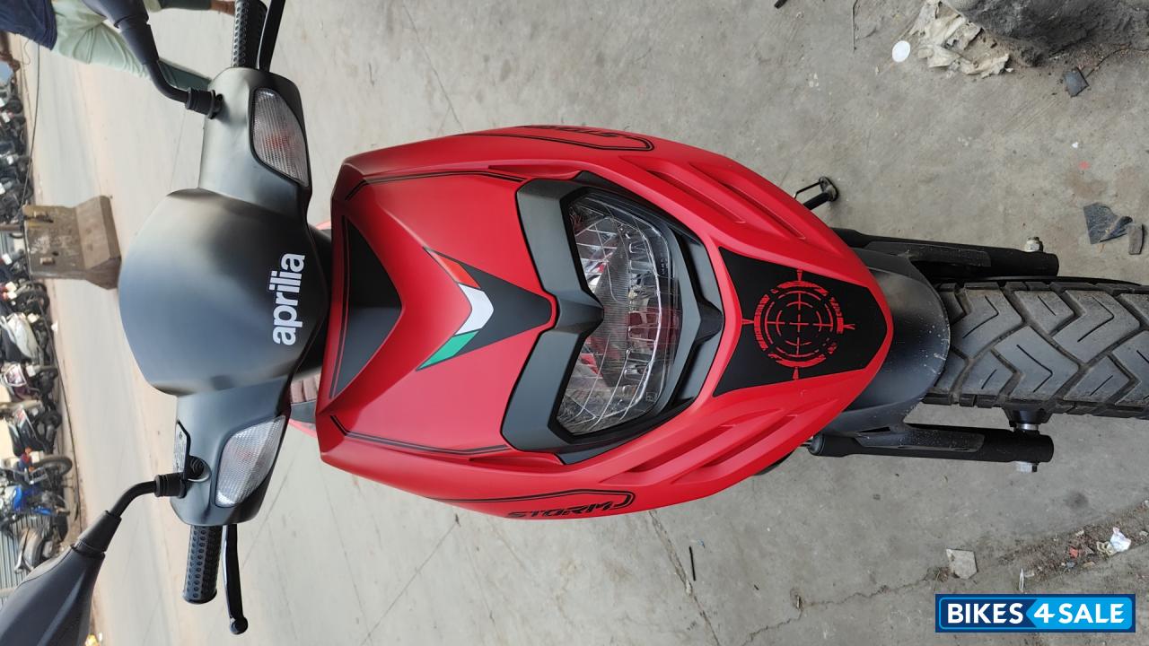 Red Aprilia Storm 125