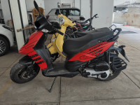 Red Aprilia Storm 125