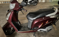 Maroon Honda Aviator