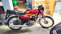 Red Suzuki Ind-Suzuki AX 100
