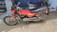 Red Suzuki Ind-Suzuki AX 100