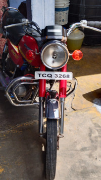 Red Suzuki Ind-Suzuki AX 100