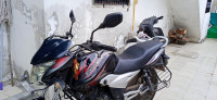 Black And Red Bajaj Discover 100T