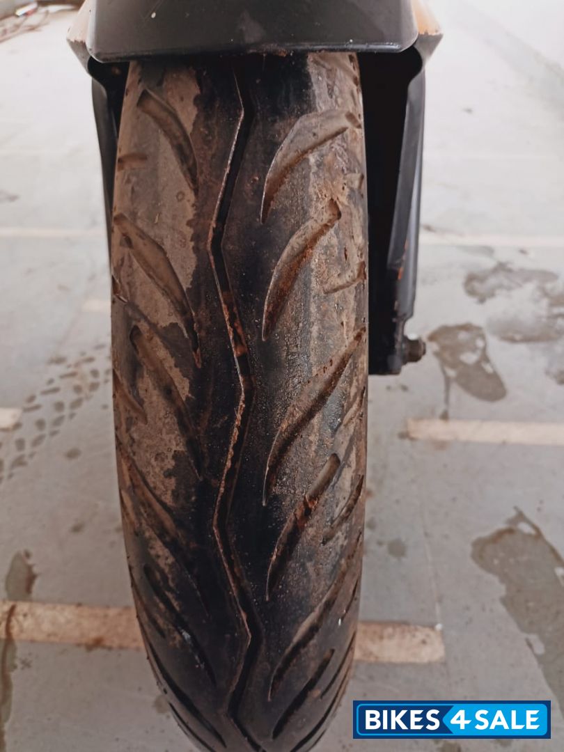 Yellow Bajaj Pulsar NS200