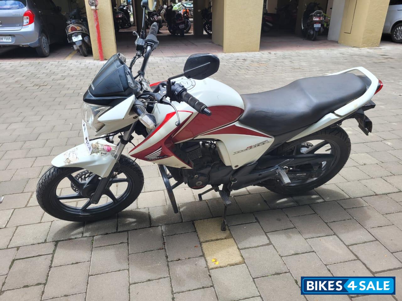 White Red Honda Unicorn Dazzler