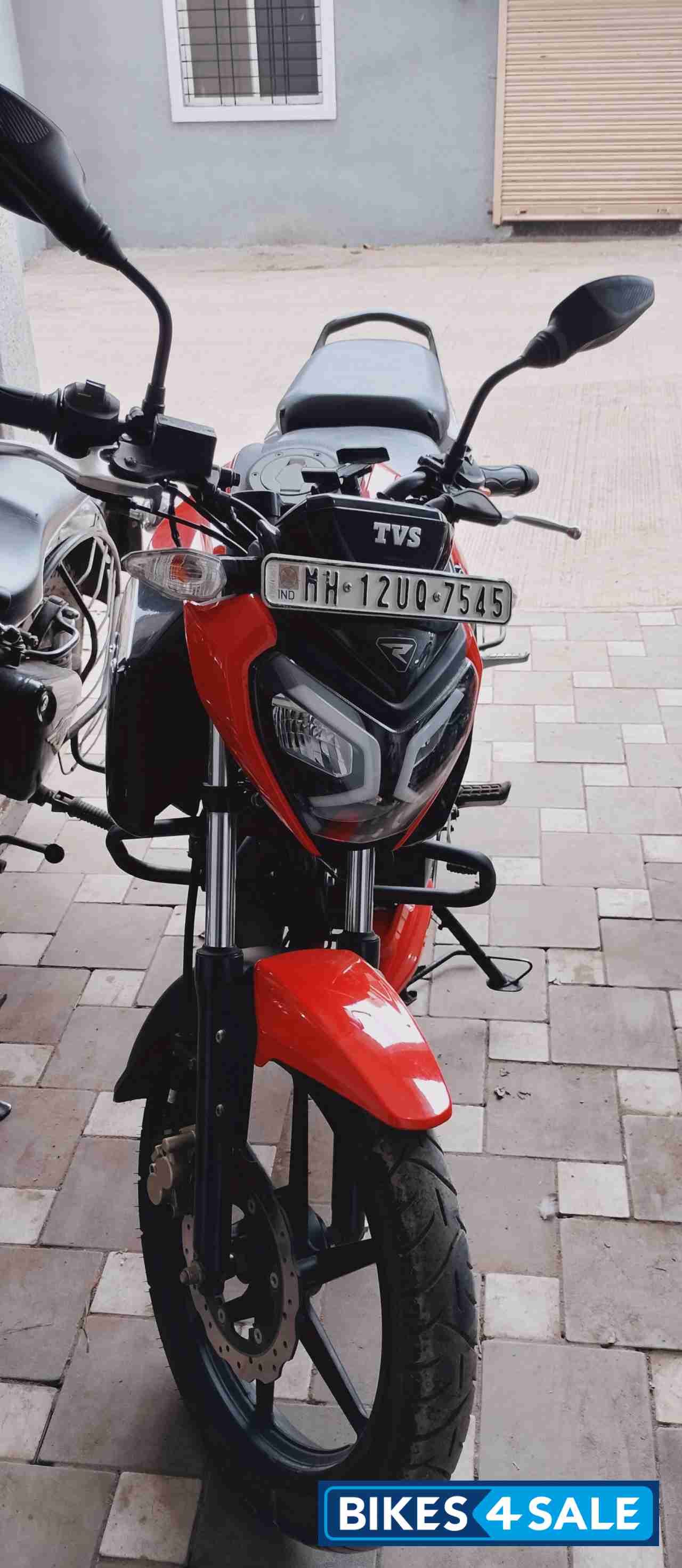 Striking Red TVS Raider 125