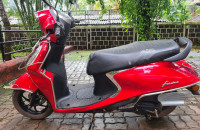 Red Yamaha Fascino 125 Fi Hybrid