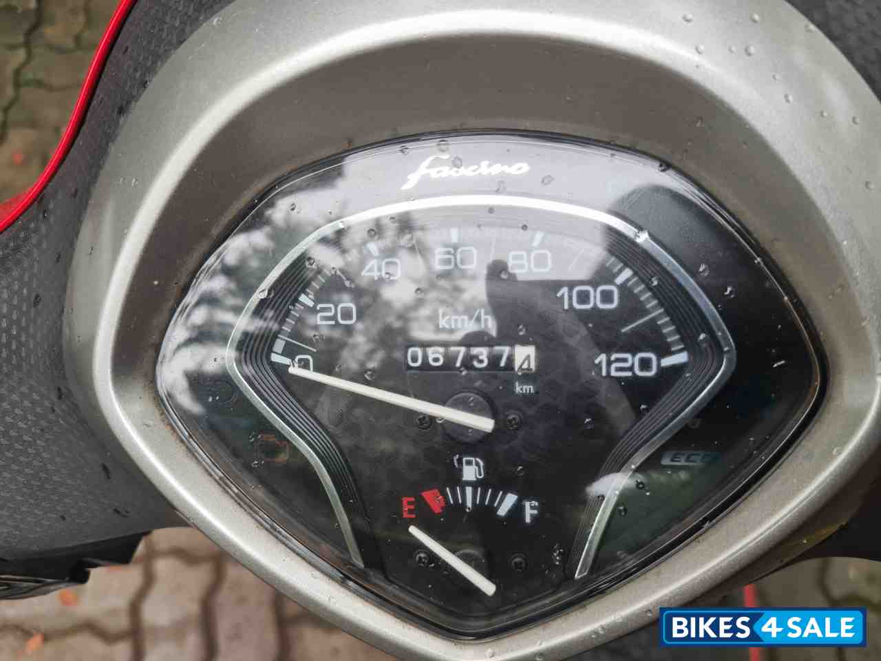 Red Yamaha Fascino 125 Fi Hybrid