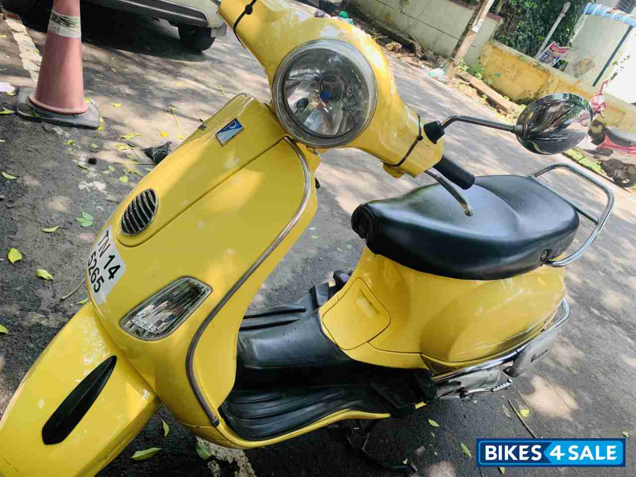 Yellow Vespa VXL 150