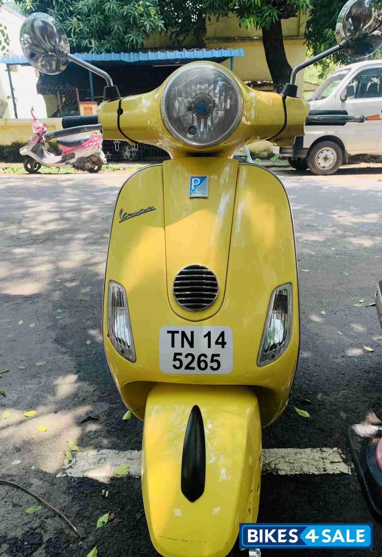 Yellow Vespa VXL 150