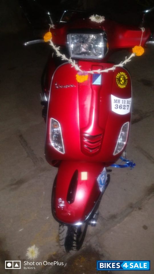 Red Vespa SXL 150