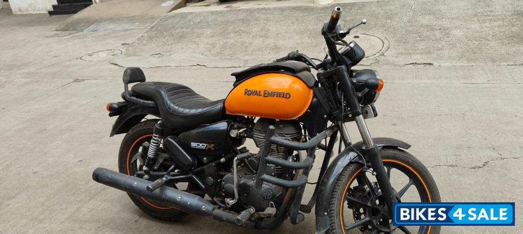 Orange Royal Enfield Thunderbird X 500
