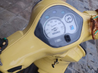 Yellow Vespa LX 125