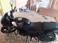 Black And Silver Bajaj Pulsar 150 Twin Disc