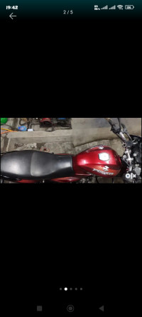 Red And Black Bajaj Discover 150 S