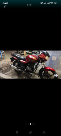 Red And Black Bajaj Discover 150 S