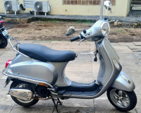 Grey Silver Vespa VXL 125