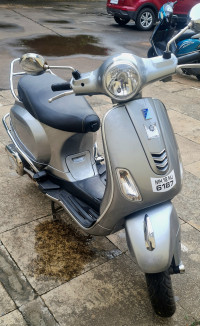 Grey Silver Vespa VXL 125
