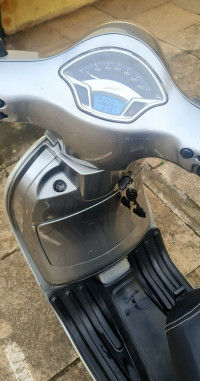 Grey Silver Vespa VXL 125