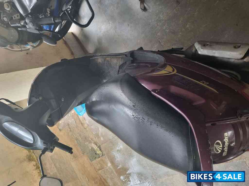 Maroon Mahindra Duro