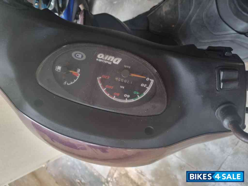 Maroon Mahindra Duro